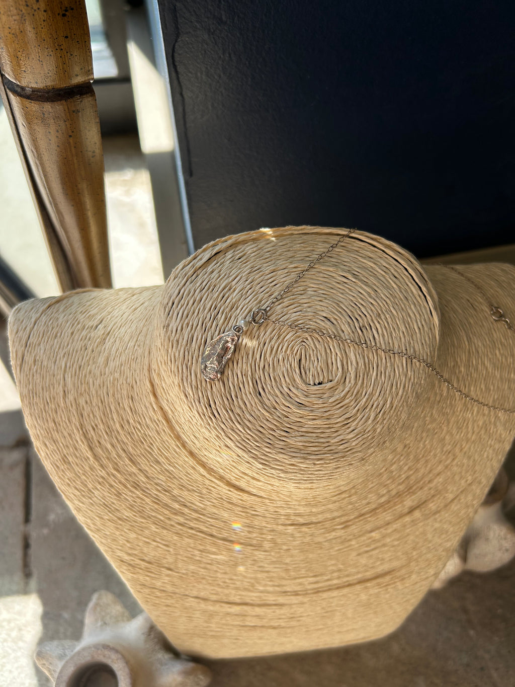 Roll of brown paper on a metal stand with a blurred background