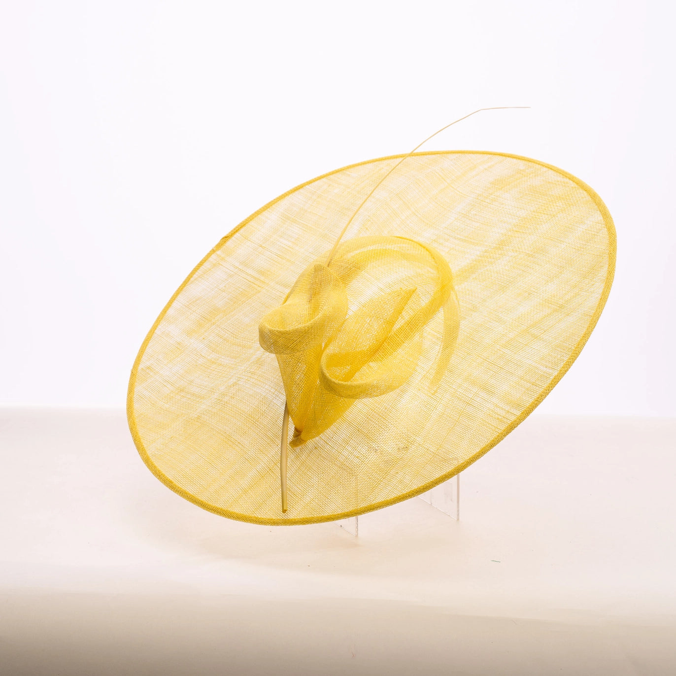 Yellow decorative hat on a white background