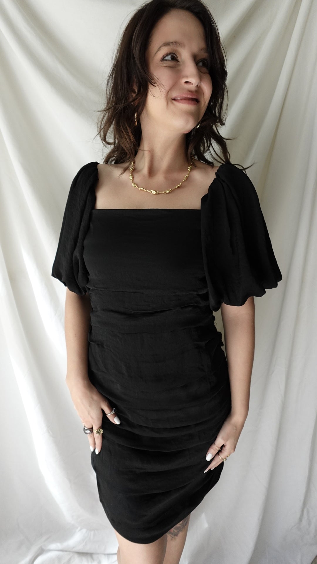 black peplum puff sleeve dress
