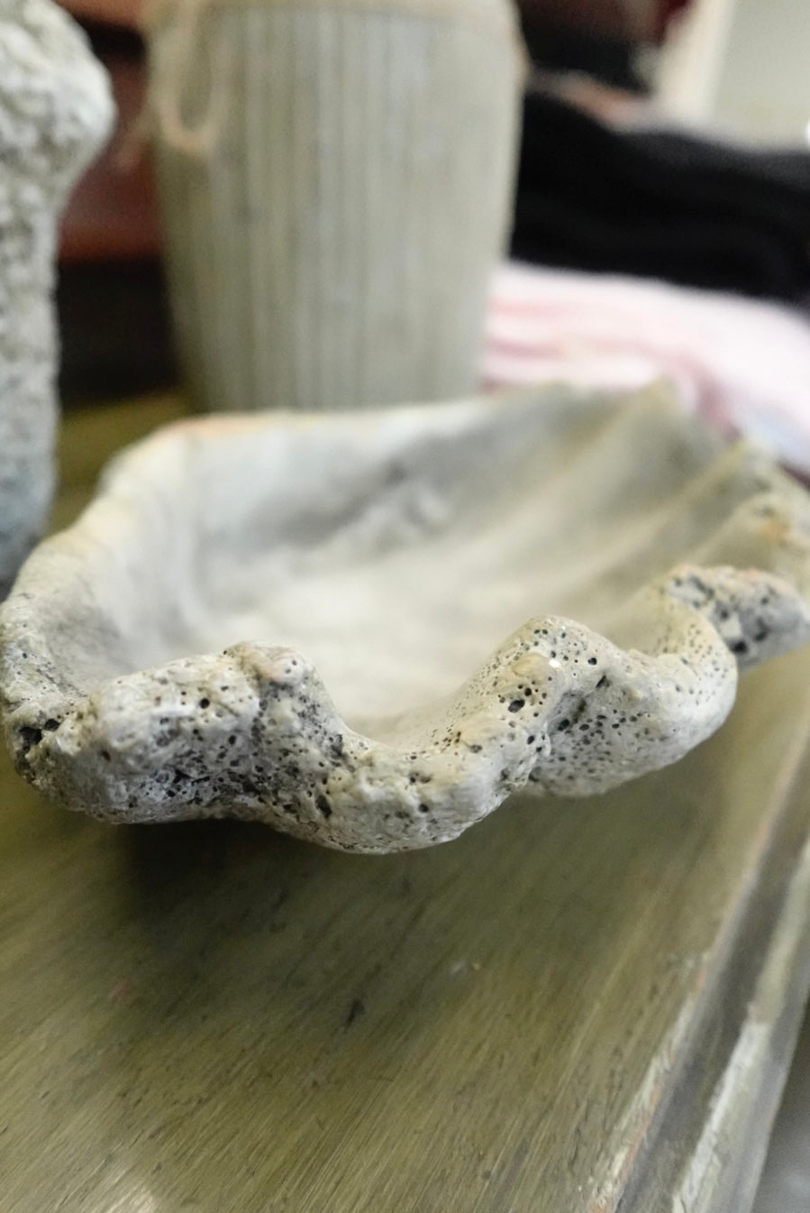 Decorative stone bowl on a wooden surface