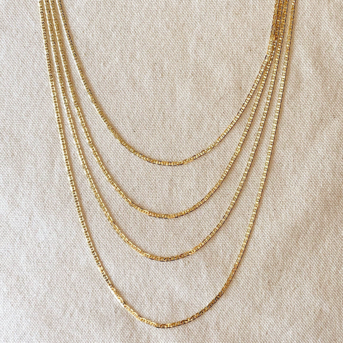 everyday gold necklace, simple gold chain, affordable gold necklace, non tarnish gold necklace, gold chain necklace, gold filled necklace, 18k gold filled necklace, dainty gold chain, minimalist gold necklace, delicate gold chain, gold necklace for women, everyday gold chain, affordable gold chain, non tarnish gold chain, water resistant gold necklace, thin gold chain, layering gold necklace, simple gold necklace, classic gold chain, yellow gold chain, gold mariner chain, flat mariner necklace, gold anchor 