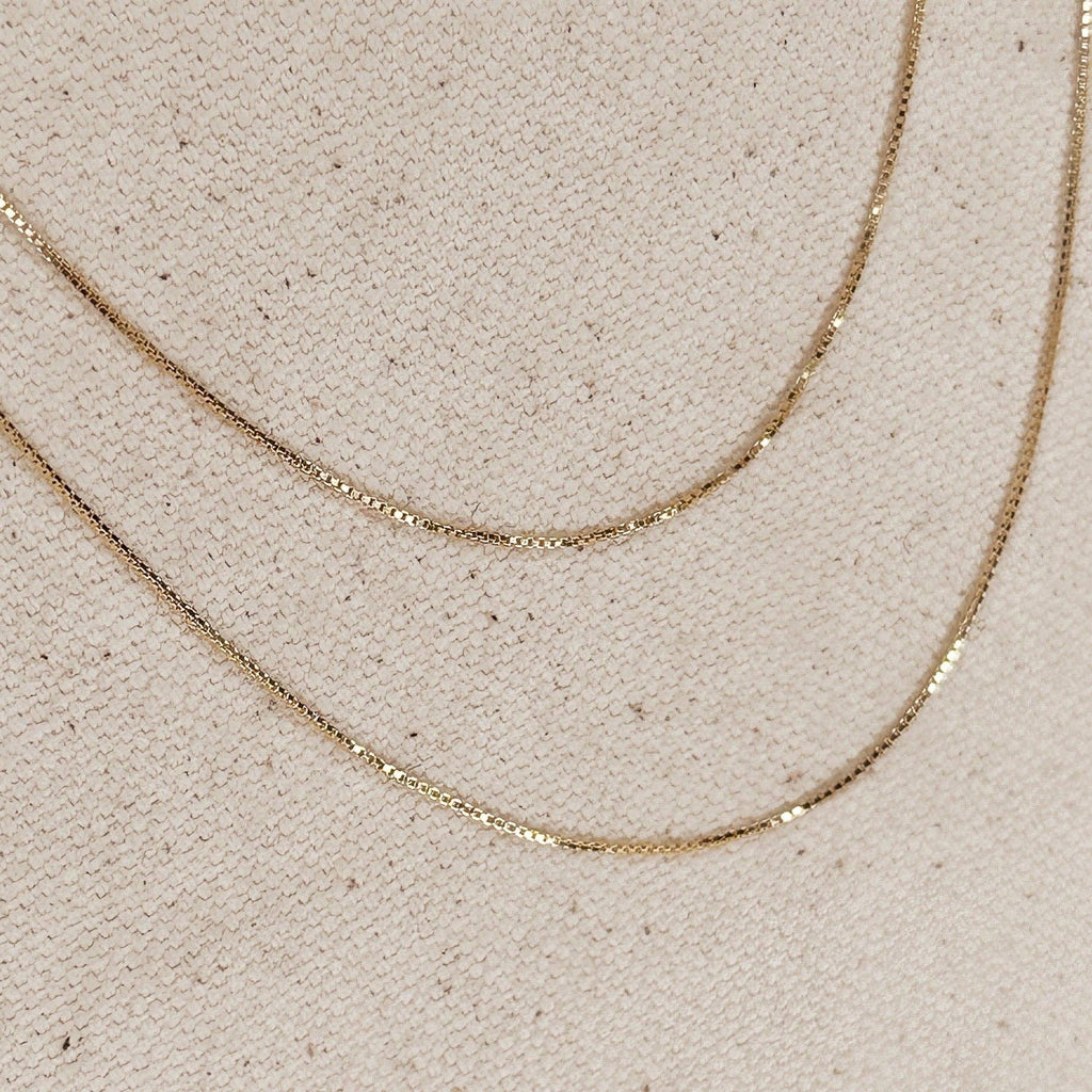 gold box chain, box chain necklace, diamond cut chain, gold filled necklace, 18k gold filled necklace, thin gold chain, dainty gold necklace, delicate gold chain, 0.5mm gold chain, simple gold necklace, everyday gold necklace, minimalist gold necklace, layering necklace, fine gold chain, gold chain for women, classic gold necklace, subtle sparkle necklace, non tarnish gold necklace, water resistant necklace, hypoallergenic necklace, nickel free necklace, affordable gold chain, 16 inch gold necklace, 18 inch