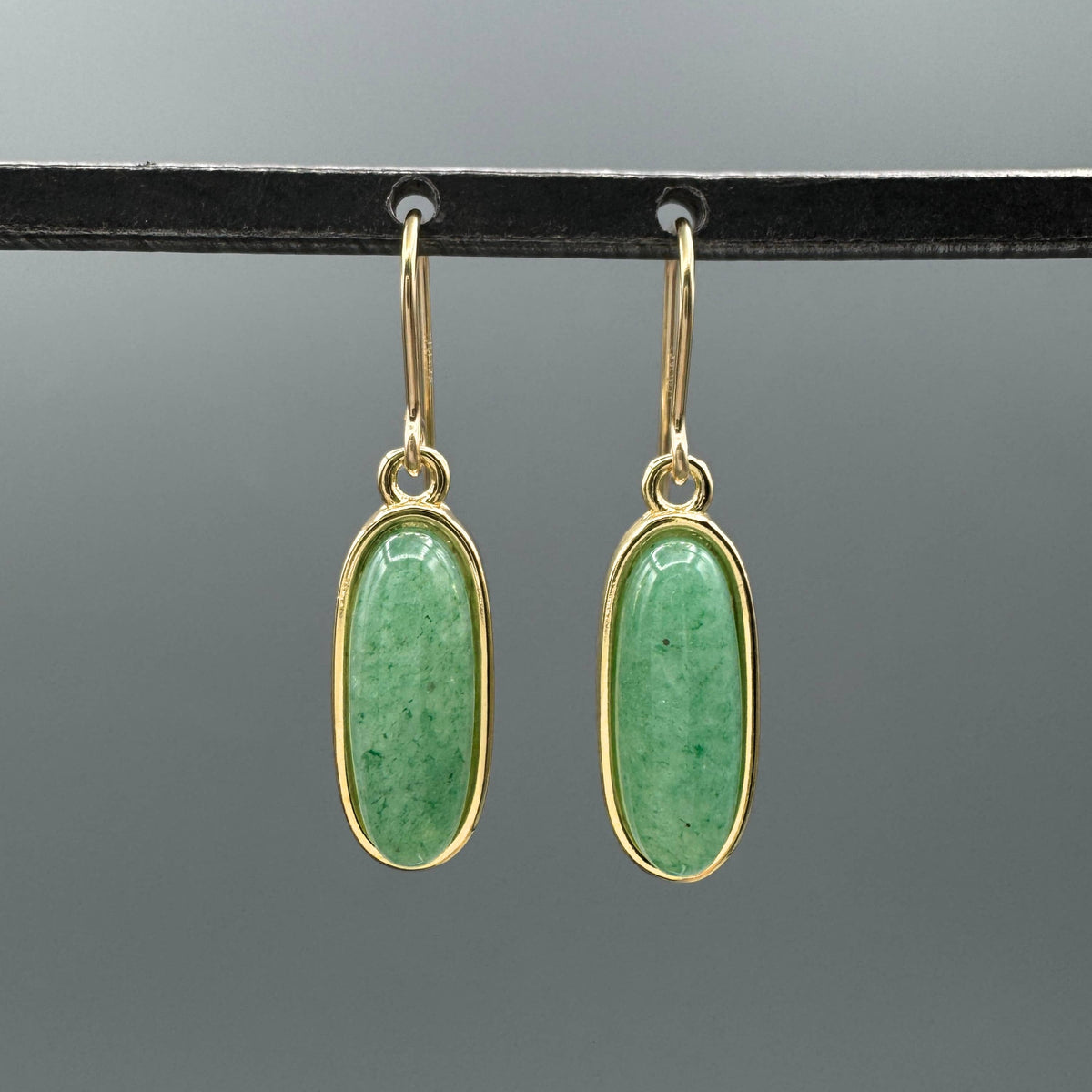 green aventurine earrings, aventurine earrings, gold aventurine earrings, green gemstone earrings, natural stone earrings, oval stone earrings, oblong stone earrings, elongated oval earrings, bezel set earrings, gold bezel earrings, green stone earrings, 14k gold filled earrings, gold filled earrings, gemstone stud earrings, oval stud earrings, statement studs, everyday earrings, minimalist earrings, earthy jewelry, botanical jewelry, nature inspired jewelry, green jewelry, demi fine jewelry, gold filled je