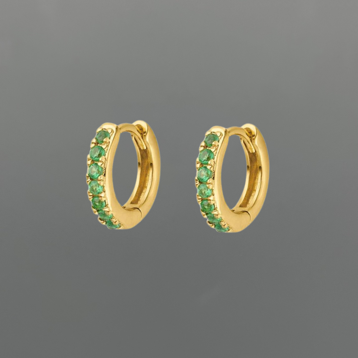 light green huggies, green CZ huggies, green hoop earrings, light green earrings, CZ clicker huggies, clicker hoop earrings, cubic zirconia earrings, green cubic zirconia, small hoop earrings, mini huggie hoops, 9.5mm hoops, gold filled huggies, 14k gold filled earrings, sterling silver huggies, 925 sterling silver earrings, gold huggie earrings, silver huggie earrings, dainty green earrings, gemstone look earrings, everyday hoop earrings, ear stack earrings, second piercing earrings, demi fine jewelry, gol