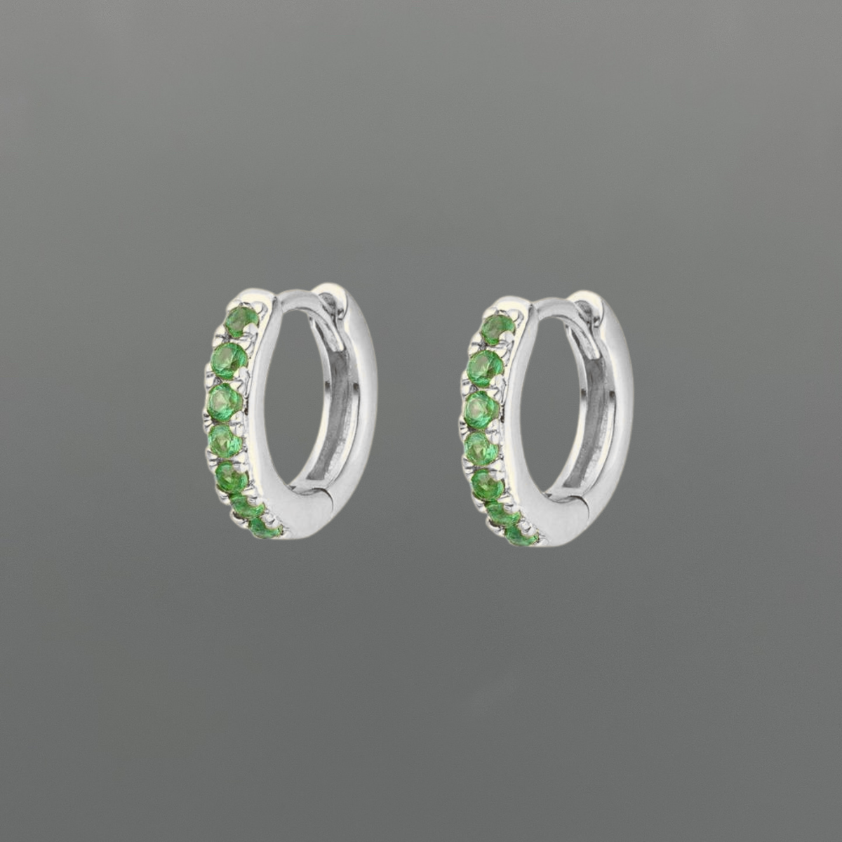 light green huggies, green CZ huggies, green hoop earrings, light green earrings, CZ clicker huggies, clicker hoop earrings, cubic zirconia earrings, green cubic zirconia, small hoop earrings, mini huggie hoops, 9.5mm hoops, gold filled huggies, 14k gold filled earrings, sterling silver huggies, 925 sterling silver earrings, gold huggie earrings, silver huggie earrings, dainty green earrings, gemstone look earrings, everyday hoop earrings, ear stack earrings, second piercing earrings, demi fine jewelry, gol