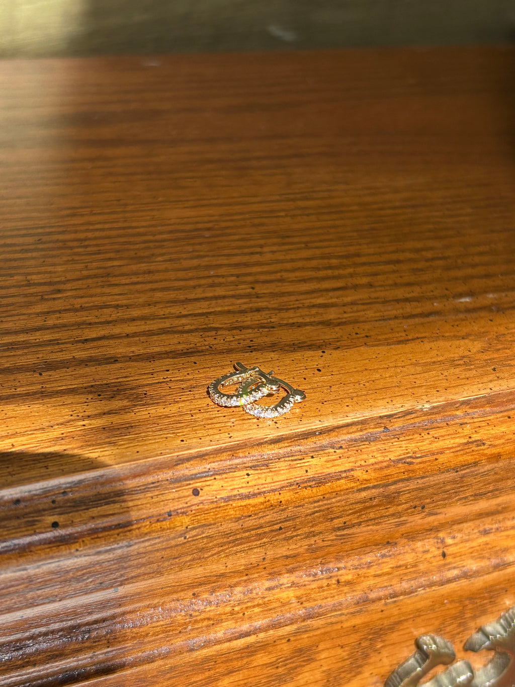 Close-up of a wooden surface with a small knot or defect.