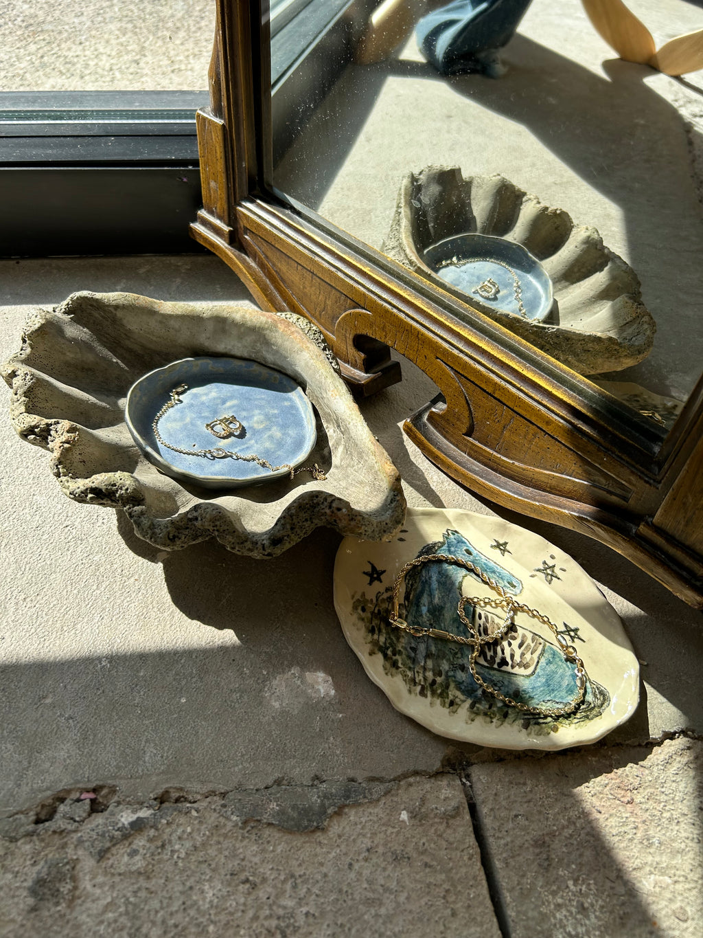 Decorative stone with star patterns on a concrete surface