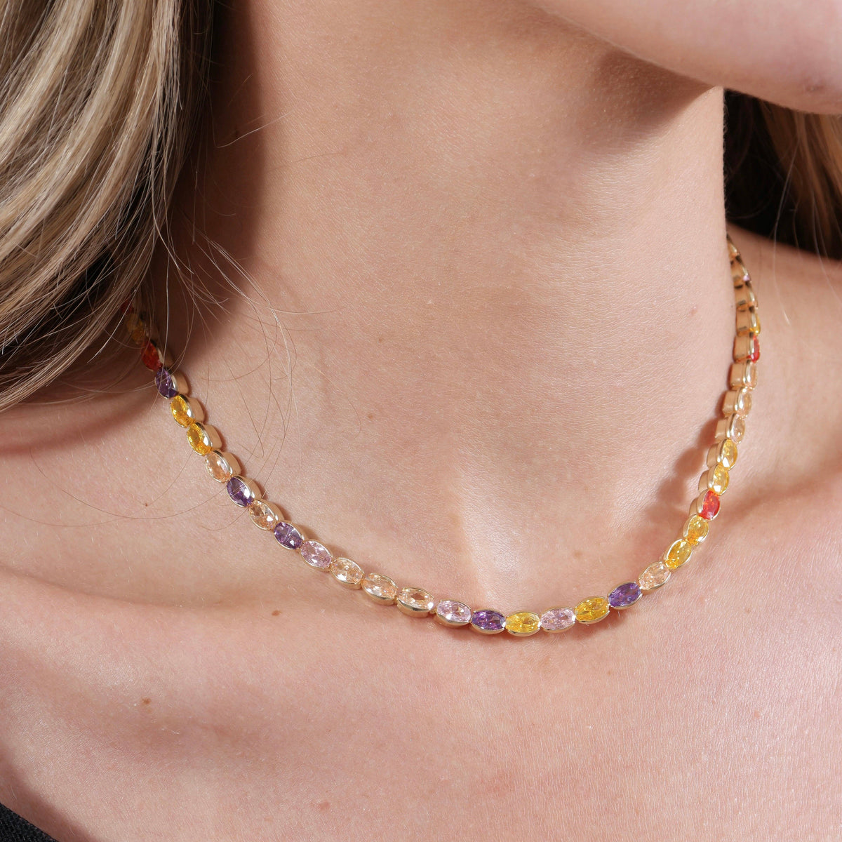 Multicolored beaded necklace on a person's neck