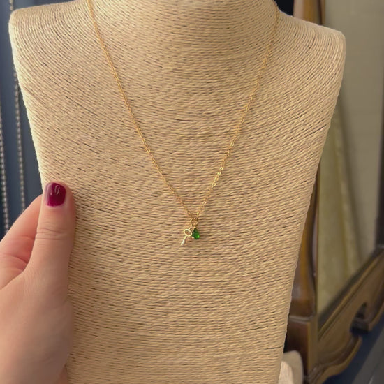 key and emerald necklace
