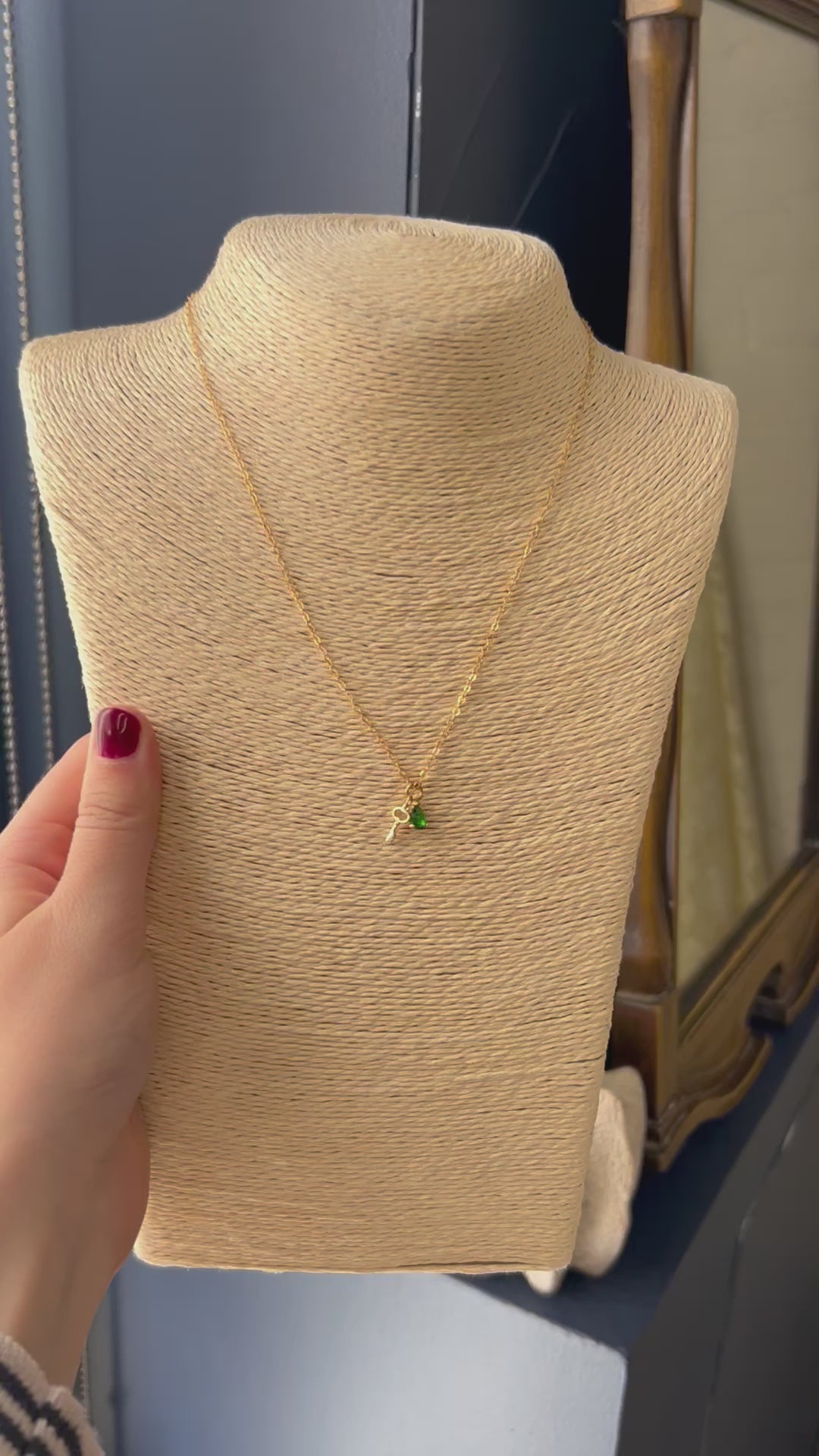 key and emerald necklace